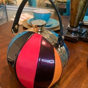 Spherical multicolored purse.